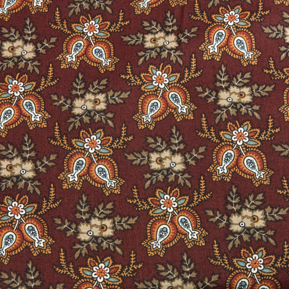 Cross Quilt by The Rocky Mountain Quilt Museum Paisleyesque Sienna