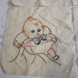 Vintage embroidered Kewpie Doll quilt blocks