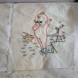 Vintage embroidered Kewpie Doll quilt blocks