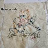 Vintage embroidered Kewpie Doll quilt blocks