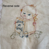 Vintage embroidered Kewpie Doll quilt blocks